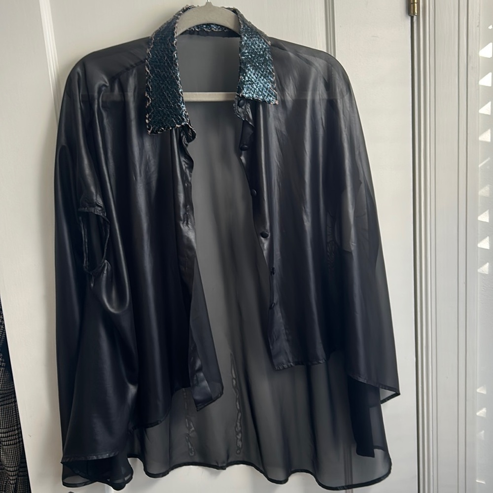 La vacaloca sheer sleeveless blouse